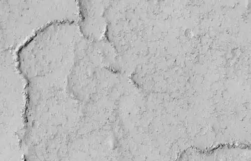 Close view of ridges  on crater floor, as seen by HiRISE under HiWish program.  Ridges are seen to be breaking up into boulders.