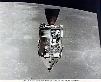 A spacecraft seen with the Moon in background