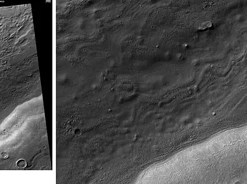 Centauri Montes, as seen by HiRISE.  Scale bar is 500 meters long.  The original enlargement of the image at the left is full of rich detail on all parts of the picture.