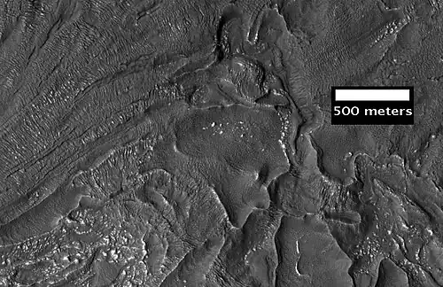 Close-up of Fretted Terrain near Reull Vallis, as seen by HiRISE.  This area would be a challenge to walk across.