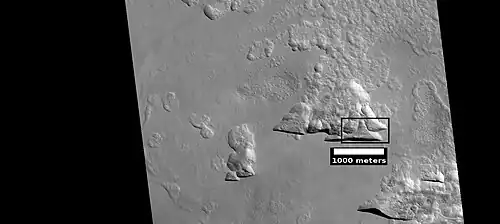 Possible variation of scalloped terrain in depressions with straight southern walls, as seen by HiRISE under HiWish program. Box indicates part enlarged in images below.  Image located in Diacria quadrangle in Milankovic crater.