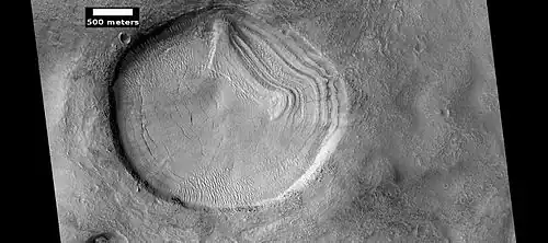 Layered features in crater, as seen by HiRISE under HiWish program