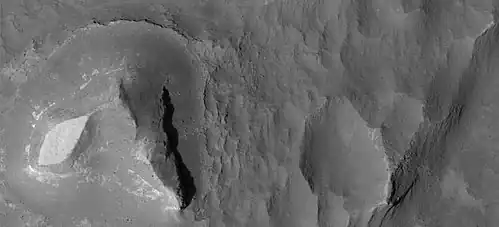 Light-toned butte on floor of Noctis Labyrinthus, as seen by HiRISE under HiWish program.  Note: this is an enlargement of a previous image.