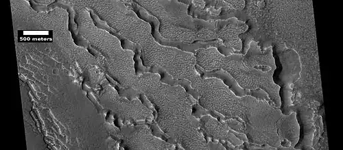 Small and large cracks, as seen by HiRISE under HiWish program  The small cracks to the left will enlarge to become much larger dues to sublimation of ground ice.  A crack exposes more surface area, hence greatly increases sublimation in the thin Martian air.