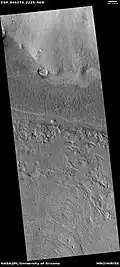 Part of lobate debris apron, as seen by HiRISE under HiWish program This lobate debris apron surrounds a mesa.  Location is the Ismenius Lacus quadrangle.