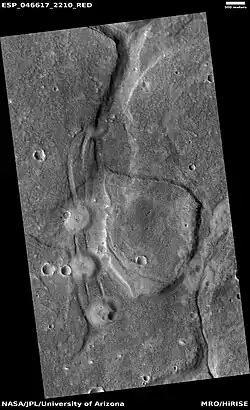Mud volcanoes, as seen by HiRISE under HiWish program. The location is Mare Acidalium quadrangle.  There are many mud volcanoes in Mare Acidalium quadrangle.