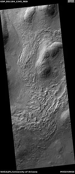 Wide view of hollows, as seen by HiRISE under HiWish program.  Hollows may be formed as ice leaves the ground.