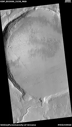 Crater with channels and ridges, as seen by HiRISE under HiWish program   Note the channel on the rim.  This crater probably once held a lake.
