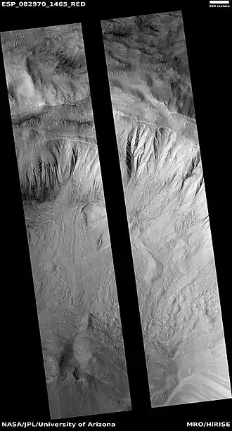 Wide view of gullies in a crater, as seen by HiRISE under HiWish program  The black strip is where data were not gathered.  This image was named HiRISE Picture of the Day for June 25, 2024.