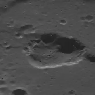 The central depression of Geddes is irregular in shape and may be a collapse feature rather than an impact crater