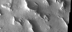 Gigas Sulci, as seen by THEMIS.  Wavy linear ridges are dunes.  Dark slope streaks are visible on some slopes if you click on image for larger view.