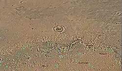 Map of Ismenius Lacus quadrangle which is located just north of Arabia, a large bright area of Mars.  It contains large amounts of ice in glaciers that surround hills.
