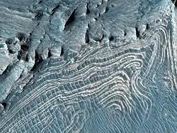 Close view of layers in Candor.  Image has been processed in color to bring out more detail.  It was named HiRISE picture of the day for November 9, 2023.