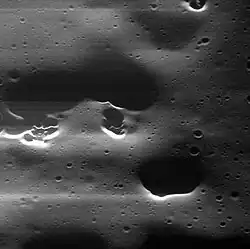 Mansur crater has hollows. Mansur has the type morphology of a Mansurian crater.
