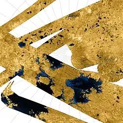 High-resolution false-color Cassini synthetic aperture radar mosaic of Titan's north polar region, showing hydrocarbon seas, lakes and tributary networks. Blue coloring indicates low radar reflectivity areas, caused by bodies of liquid ethane, methane and dissolved nitrogen. About half of Kraken Mare, the large body at lower left, is outside the image. Ligeia Mare is the large body at lower right. Punga Mare is just left of center. Jingpo Lacus is just above Kraken Mare, and Bolsena Lacus is directly above it.