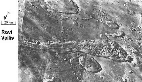 Ravi Vallis, as seen by Viking Orbiter. Ravi Vallis was probably formed when catastrophic floods came out of the ground to the right (chaotic terrain).  Image located in Margaritifer Sinus quadrangle.