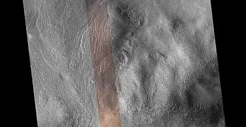 Wide view of channel network, as seen by HiRISE under HiWish program  Colored strip in center is about 1 km across.