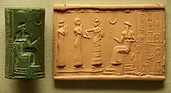 Sumerian cylinder seal and impression, dated c. 2100 BC, of Ḫašḫamer, ensi (governor) of Iškun-Sin c. 2100 BC. The seated figure is probably king Ur-Nammu, bestowing the governorship on Ḫašḫamer, who is led before him by Lamma (protective goddess)..mw-parser-output cite.citation{font-style:inherit;word-wrap:break-word}.mw-parser-output .citation q{quotes:"\"""\"""'""'"}.mw-parser-output .citation:target{background-color:rgba(0,127,255,0.133)}.mw-parser-output .id-lock-free.id-lock-free a{background:url("//upload.wikimedia.org/wikipedia/commons/6/65/Lock-green.svg")right 0.1em center/9px no-repeat}.mw-parser-output .id-lock-limited.id-lock-limited a,.mw-parser-output .id-lock-registration.id-lock-registration a{background:url("//upload.wikimedia.org/wikipedia/commons/d/d6/Lock-gray-alt-2.svg")right 0.1em center/9px no-repeat}.mw-parser-output .id-lock-subscription.id-lock-subscription a{background:url("//upload.wikimedia.org/wikipedia/commons/a/aa/Lock-red-alt-2.svg")right 0.1em center/9px no-repeat}.mw-parser-output .cs1-ws-icon a{background:url("//upload.wikimedia.org/wikipedia/commons/4/4c/Wikisource-logo.svg")right 0.1em center/12px no-repeat}body:not(.skin-timeless):not(.skin-minerva) .mw-parser-output .id-lock-free a,body:not(.skin-timeless):not(.skin-minerva) .mw-parser-output .id-lock-limited a,body:not(.skin-timeless):not(.skin-minerva) .mw-parser-output .id-lock-registration a,body:not(.skin-timeless):not(.skin-minerva) .mw-parser-output .id-lock-subscription a,body:not(.skin-timeless):not(.skin-minerva) .mw-parser-output .cs1-ws-icon a{background-size:contain;padding:0 1em 0 0}.mw-parser-output .cs1-code{color:inherit;background:inherit;border:none;padding:inherit}.mw-parser-output .cs1-hidden-error{display:none;color:var(--color-error,#d33)}.mw-parser-output .cs1-visible-error{color:var(--color-error,#d33)}.mw-parser-output .cs1-maint{display:none;color:#085;margin-left:0.3em}.mw-parser-output .cs1-kern-left{padding-left:0.2em}.mw-parser-output .cs1-kern-right{padding-right:0.2em}.mw-parser-output .citation .mw-selflink{font-weight:inherit}@media screen{.mw-parser-output .cs1-format{font-size:95%}html.skin-theme-clientpref-night .mw-parser-output .cs1-maint{color:#18911f}}@media screen and (prefers-color-scheme:dark){html.skin-theme-clientpref-os .mw-parser-output .cs1-maint{color:#18911f}}"Cylinder vase". Collections Search – Museum of Fine Arts, Boston. May 20, 1987. Archived from the original on November 11, 2021. Retrieved November 11, 2021.