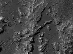Layers in Uzboi Vallis, as seen by HiRISE.  Image located in the Margaritifer Sinus quadrangle.