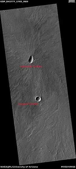 Volcanic crater (upper) and impact crater (lower).  Image about 5 km across.