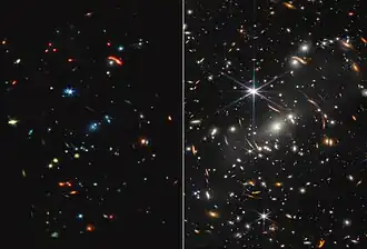 This frame is split down the middle. Webb’s mid-infrared image is shown at left, and Webb’s near-infrared image on the right. The mid-infrared image appears much darker, with many fewer points of light. Stars have very short diffraction spikes. Galaxies and stars also appear in a range of colors, including blue, green, yellow, and red. The near-infrared image appears busier, with many more points of light. Thousands of galaxies and stars appear all across the view. They are sharper and more distinct than what is seen in the mid-infrared view. Some galaxies are shades of orange, while others are white. Most stars appear blue with long diffraction spikes, forming an eight-pointed star shapes. There are also many thin, long, orange arcs that curve around the center of the image..mw-parser-output cite.citation{font-style:inherit;word-wrap:break-word}.mw-parser-output .citation q{quotes:"\"""\"""'""'"}.mw-parser-output .citation:target{background-color:rgba(0,127,255,0.133)}.mw-parser-output .id-lock-free.id-lock-free a{background:url("//upload.wikimedia.org/wikipedia/commons/6/65/Lock-green.svg")right 0.1em center/9px no-repeat}.mw-parser-output .id-lock-limited.id-lock-limited a,.mw-parser-output .id-lock-registration.id-lock-registration a{background:url("//upload.wikimedia.org/wikipedia/commons/d/d6/Lock-gray-alt-2.svg")right 0.1em center/9px no-repeat}.mw-parser-output .id-lock-subscription.id-lock-subscription a{background:url("//upload.wikimedia.org/wikipedia/commons/a/aa/Lock-red-alt-2.svg")right 0.1em center/9px no-repeat}.mw-parser-output .cs1-ws-icon a{background:url("//upload.wikimedia.org/wikipedia/commons/4/4c/Wikisource-logo.svg")right 0.1em center/12px no-repeat}body:not(.skin-timeless):not(.skin-minerva) .mw-parser-output .id-lock-free a,body:not(.skin-timeless):not(.skin-minerva) .mw-parser-output .id-lock-limited a,body:not(.skin-timeless):not(.skin-minerva) .mw-parser-output .id-lock-registration a,body:not(.skin-timeless):not(.skin-minerva) .mw-parser-output .id-lock-subscription a,body:not(.skin-timeless):not(.skin-minerva) .mw-parser-output .cs1-ws-icon a{background-size:contain;padding:0 1em 0 0}.mw-parser-output .cs1-code{color:inherit;background:inherit;border:none;padding:inherit}.mw-parser-output .cs1-hidden-error{display:none;color:var(--color-error,#d33)}.mw-parser-output .cs1-visible-error{color:var(--color-error,#d33)}.mw-parser-output .cs1-maint{display:none;color:#085;margin-left:0.3em}.mw-parser-output .cs1-kern-left{padding-left:0.2em}.mw-parser-output .cs1-kern-right{padding-right:0.2em}.mw-parser-output .citation .mw-selflink{font-weight:inherit}@media screen{.mw-parser-output .cs1-format{font-size:95%}html.skin-theme-clientpref-night .mw-parser-output .cs1-maint{color:#18911f}}@media screen and (prefers-color-scheme:dark){html.skin-theme-clientpref-os .mw-parser-output .cs1-maint{color:#18911f}}"Webb's First Deep Field (MIRI and NIRCam Images Side by Side)". This article incorporates text from this source, which is in the public domain.