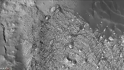 Some of the layers of Danielson are just visible in this CTX image.  Dunes are also visible.