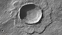 Resen Crater as seen by CTX camera (on Mars Reconnaissance Orbiter).  Besides showing the ejecta, image shows small pits on crater floor caused by escaping steam.  Note: this image is an enlargement of the previous image of Resen.