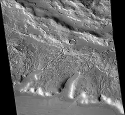 Channels just to south of Sinton, as seen by CTX camera. These were created when the impact occurred in ice-rich ground.  Note: this is an enlargement of the previous image of west side of Sinton.