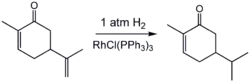 Selective hydrogenation of the less hindered alkene group in carvone using a homogeneous catalyst (Wilkinson's catalyst).
