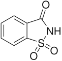 Saccharin, a cyclic sulfonamide that was one of the first artificial sweeteners discovered