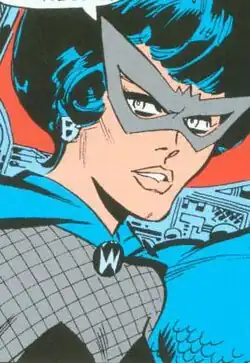 Black Widow with a black bouffant hairdo, a domino mask, a fishnet top, and a cape