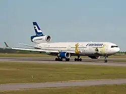 Finnair MD-11 decorated with Moomin characters serving the Japanese route