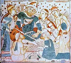 Possible Bactrians revelling, on the ceiling of the central hall of Cave 1 of Ajanta caves, India (460–480 CE).