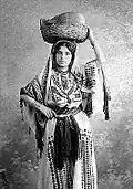 Traditional Women's Dress in Ramallah. Khalil Raad, c. 1920.