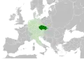 The Czech state in form of Duchy of Bohemia (green) in 11th century, within the Holy Roman Empire (light green).