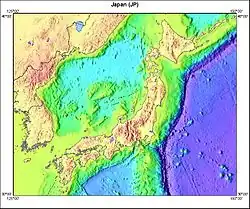 A topographical map of Japan and the surrounding ocean and landmasses, showing different elevations with different colors.