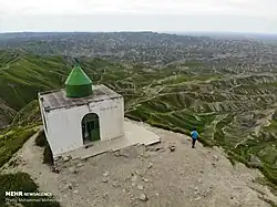 Image of the shrine at Khalid Nabi Cemetery, overlooking the hills below