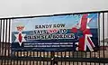 Banner opposing post-Brexit border controls between Great Britain and Northern Ireland seen in Sandy Row (March 2021)