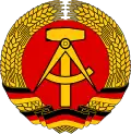 A compass on the former National Emblem of East Germany (former German Democratic Republic).
