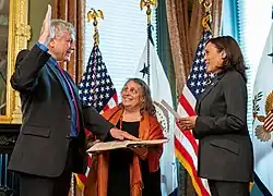 Lander places hand on ancient text