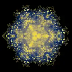 Blue, yellow, and gold fractal doily with a tilted hamster-face in the middle (that's just pareidolia, but inescapable). Triple symmetry with sharp points at 9 o'clock, at 1 o'clock, and 5 o'clock.