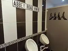 Gents' toilets inspired by the Beatles album Abbey Road in Parkend, England