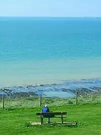 Man sitting alone on a bench
