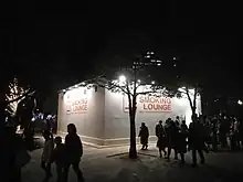 Temporary smoking room and a sales promotion of glo at the 2016 Sendai Pageant of Starlight in Kōtōdai-kōen Park.