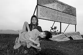 Kan Lay, 55 years old, and her son, Ke Van Bec, 14 years old, A Luoi Valley, Vietnam, December 2004.