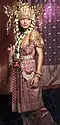 Indonesian girl wearing traditional Palembangese songket
