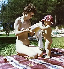 At the Herzsprung naturist FKK lake park in Brandenburg state, Germany; one of the most popular FKK bathing parks in the Angermünde district. Photo dated August 1983.