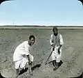 Fellahin with hoes in the fields near Cairo