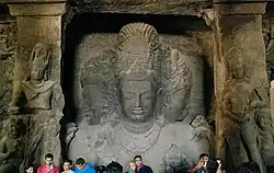The Colossal 6 metres (20&nbsp;ft) high trimurti sculpture at the Elephanta Caves