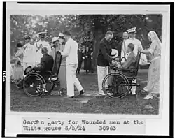 An image of a Party at the White house for disabled men as a form of inclusive social engagement